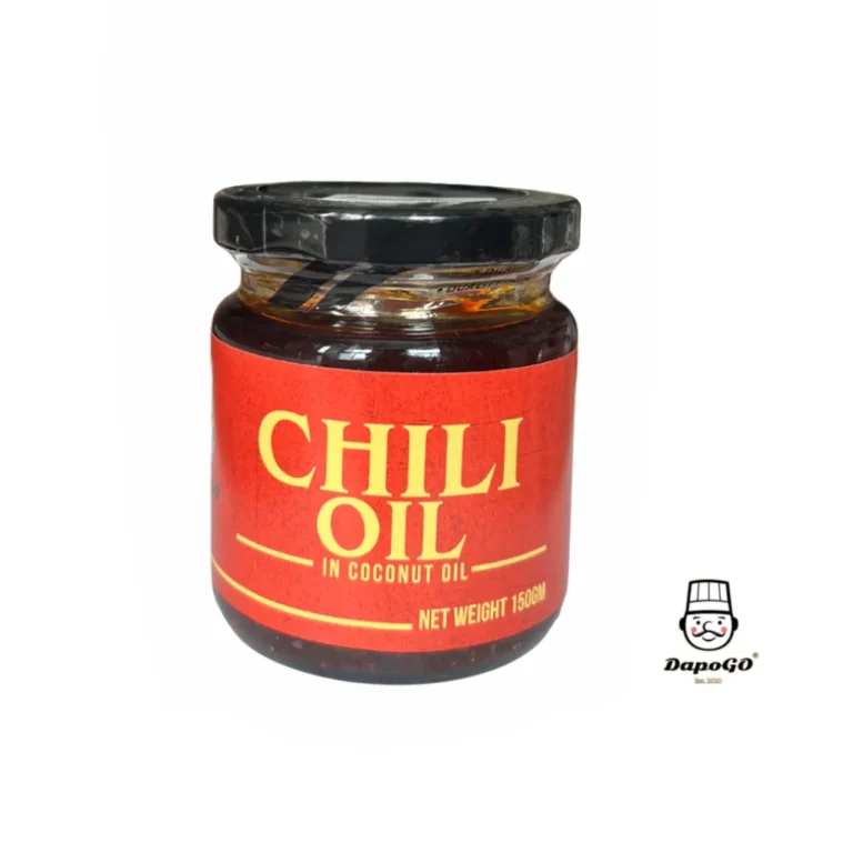 Chili Oil dalam minyak kelapa — dibotolkan, bukan dipek retort.